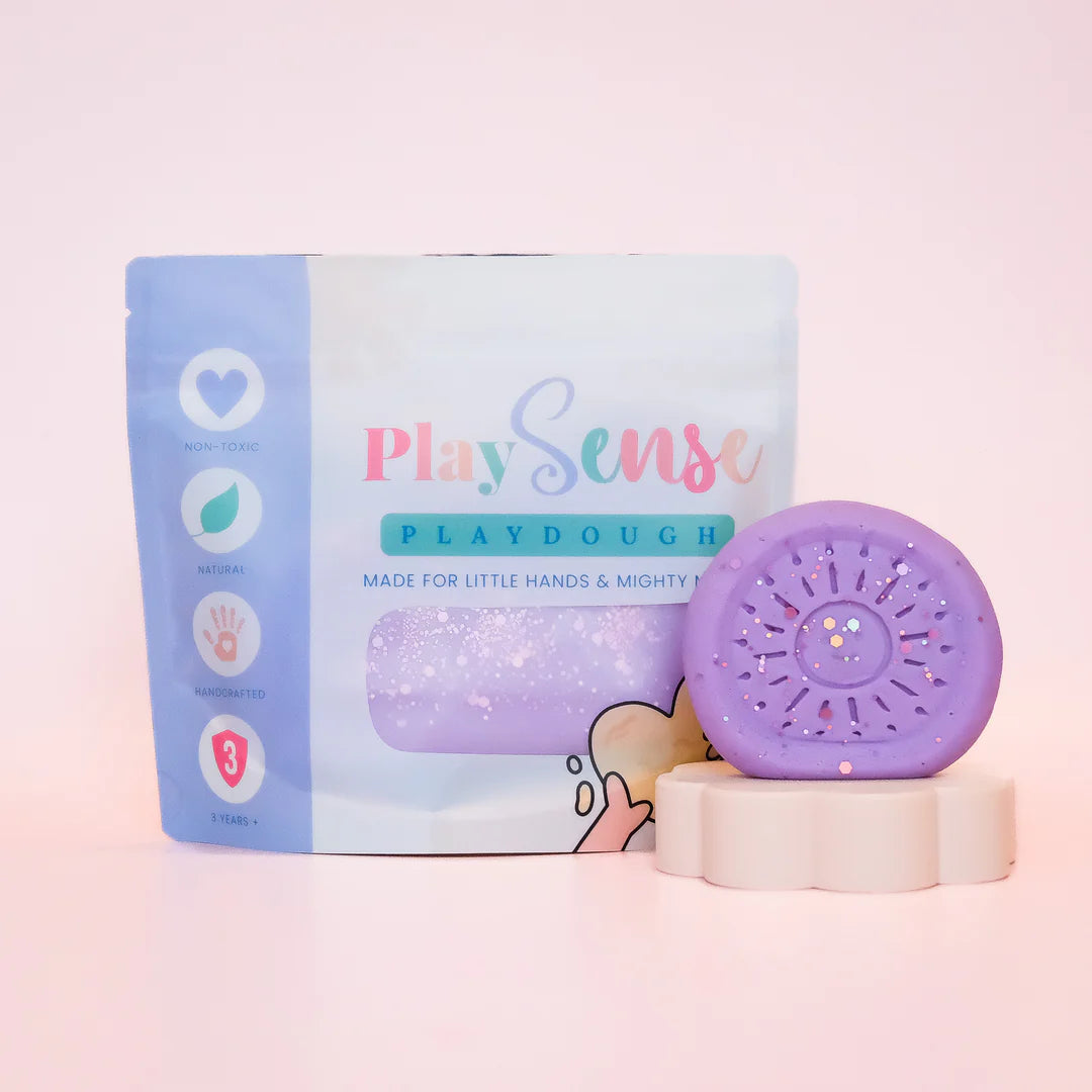 Image of dough by the brand playsense. Great for sensory play and being creative, also fine motor development. Dough is non toxic with all natural ingredients so safe for little hands. Colour and scent glitter pastel purple bubblegum