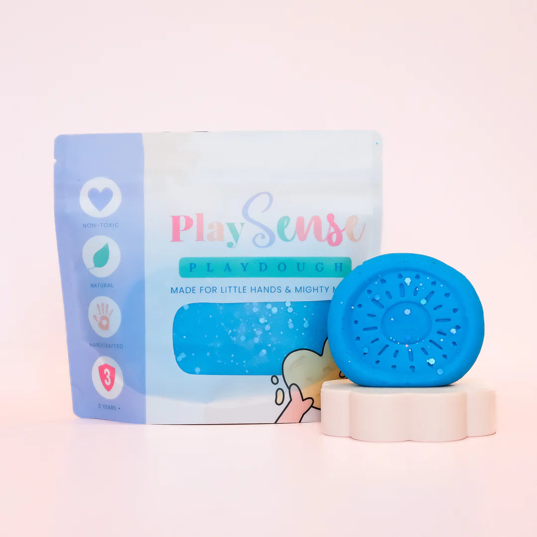 Image of dough by the brand playsense. Great for sensory play and being creative, also fine motor development. Dough is non toxic with all natural ingredients so safe for little hands. Colour and scent is Blue Glitter Slushie Scented
