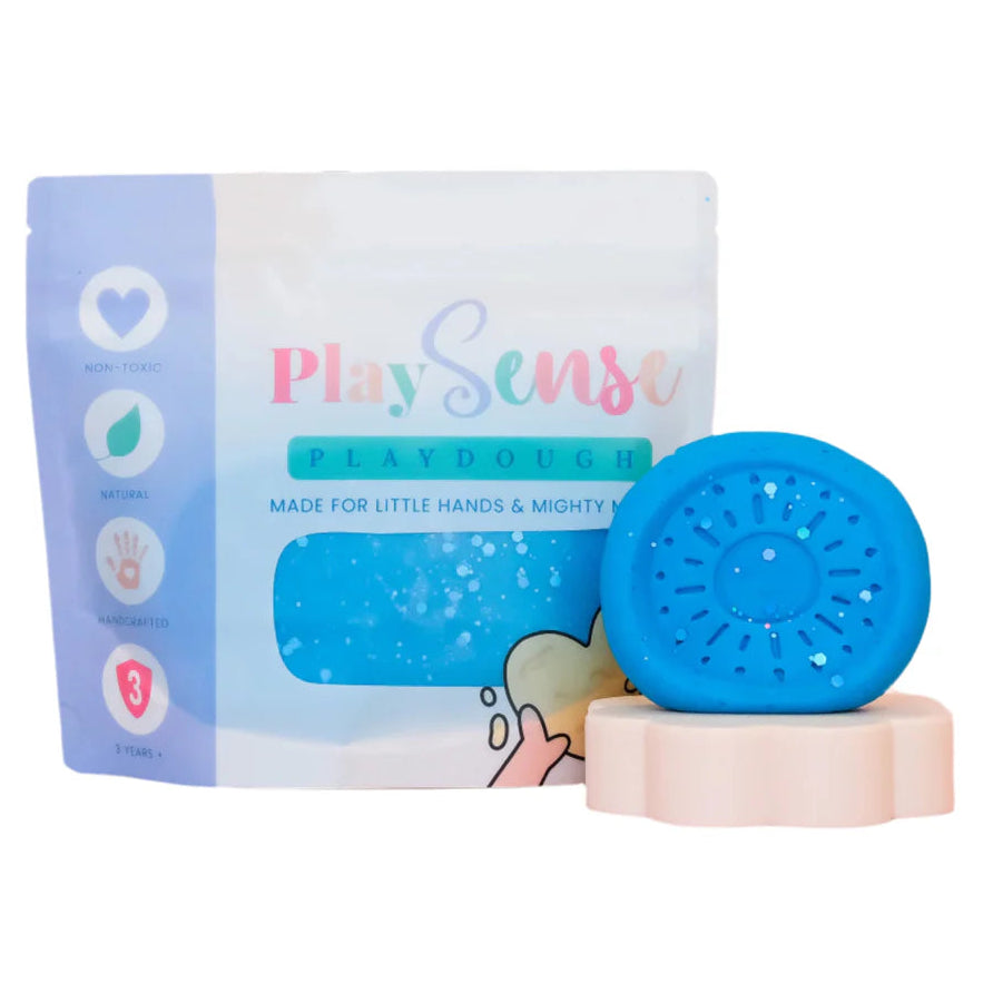 Image of dough by the brand playsense. Great for sensory play and being creative, also fine motor development. Dough is non toxic with all natural ingredients so safe for little hands. Colour and scent is Blue Glitter Slushie Scented