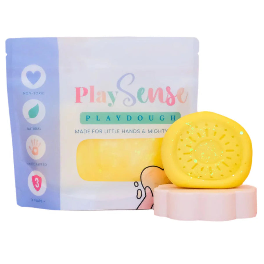 Image of dough by the brand playsense. Great for sensory play and being creative, also fine motor development. Dough is non toxic with all natural ingredients so safe for little hands. Colour and scent glitter yellow banana paddlepop