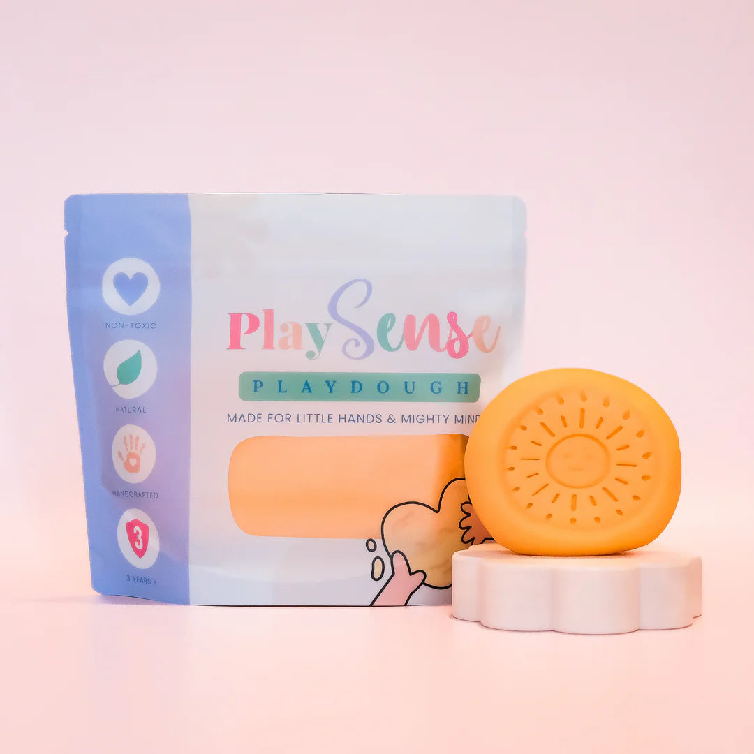 Image of dough by the brand playsense. Great for sensory play and being creative, also fine motor development. Dough is non toxic with all natural ingredients so safe for little hands. Colour and scent is Pastel Peach Fruit Salad