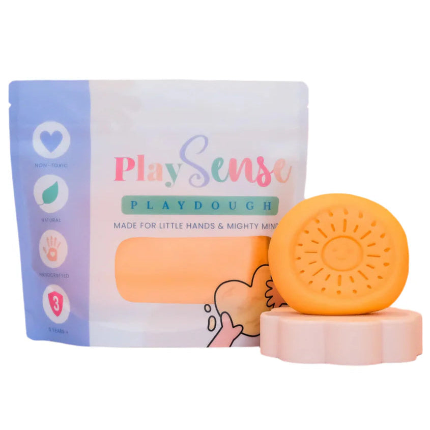 Image of dough by the brand playsense. Great for sensory play and being creative, also fine motor development. Dough is non toxic with all natural ingredients so safe for little hands. Colour and scent is Pastel Peach Fruit Salad