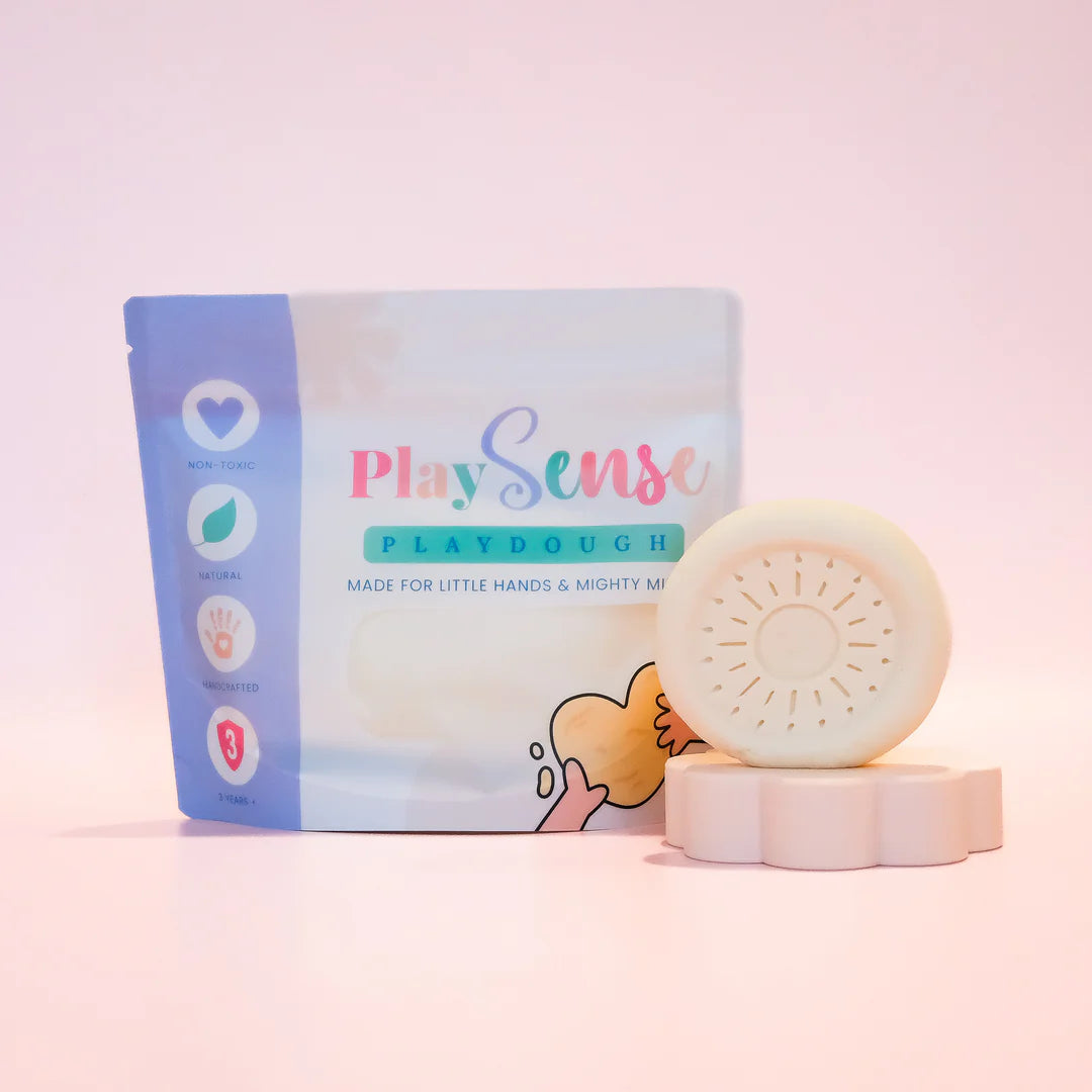 Image of dough by the brand playsense. Great for sensory play and being creative, also fine motor development. Dough is non toxic with all natural ingredients so safe for little hands. Colour and scent is White Coconut