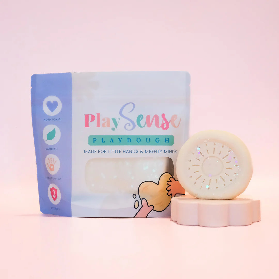 Image of dough by the brand playsense. Great for sensory play and being creative, also fine motor development. Dough is non toxic with all natural ingredients so safe for little hands. Colour and scent glitter white coconut