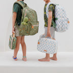 lifestyle shoot lunch bag and Fox & Fallow sage check backpack kids school bag