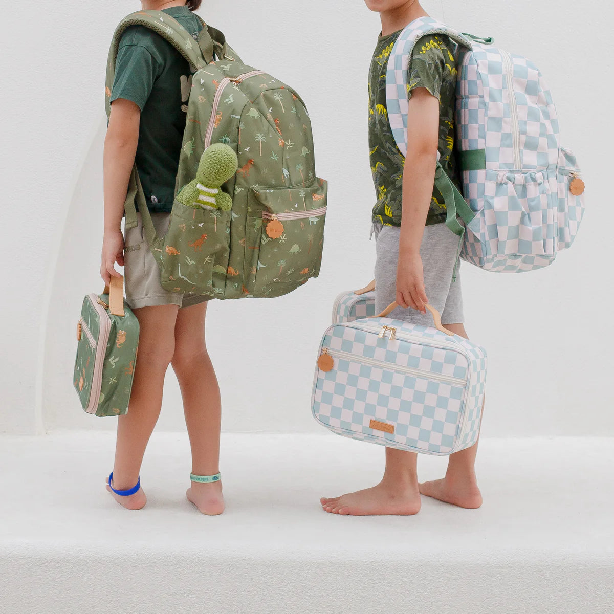 lifestyle shoot lunch bag and Fox & Fallow sage check backpack kids school bag