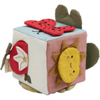 Organic cotton activity cube featuring playful garden-inspired designs