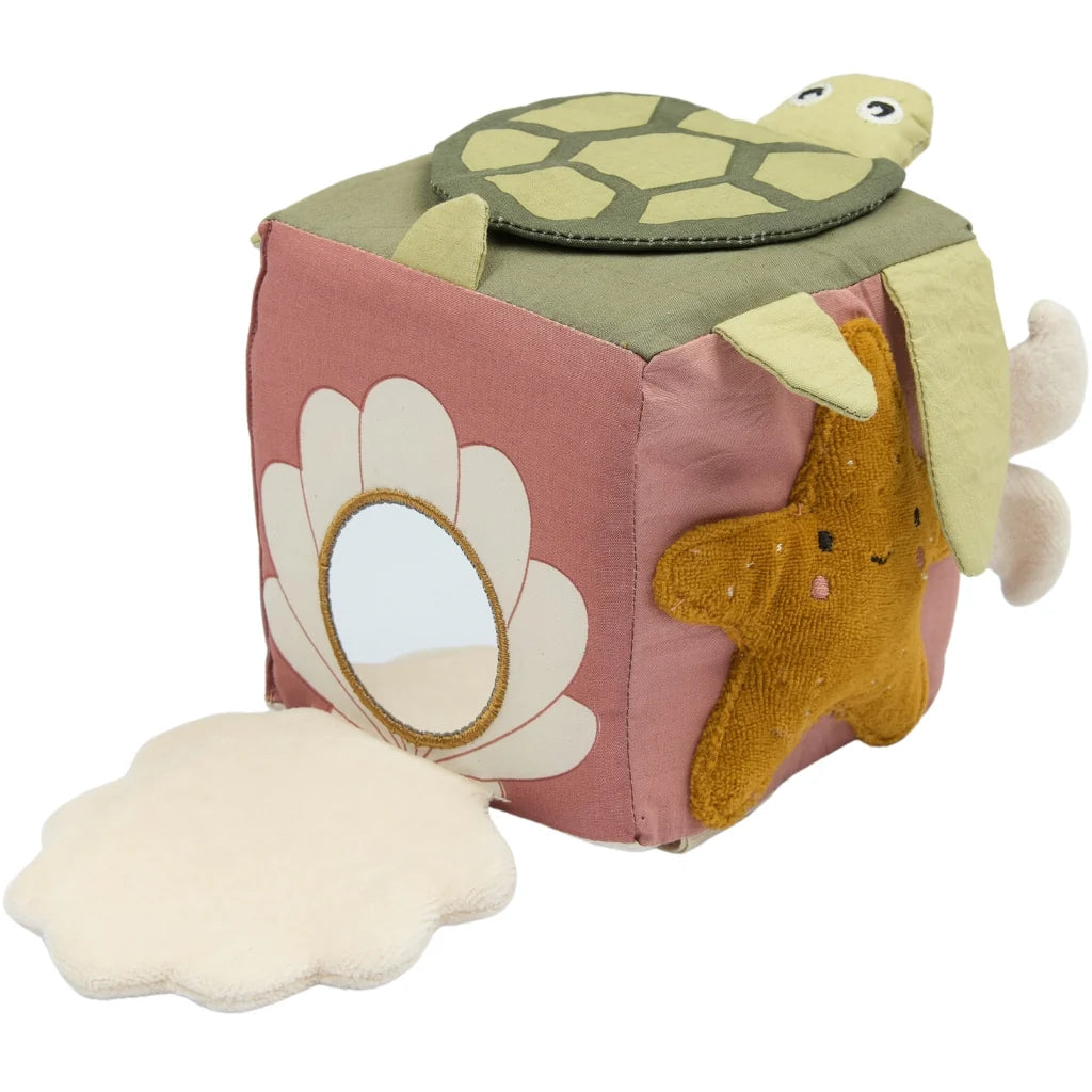 Ocean-themed baby activity cube featuring soft textures and tactile elements