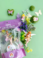 Fairy sensory play kit with butterfly charms, flowers, plants and soft playdough designed for tactile exploration and fine motor development