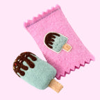 Felt ice cream toy with pink sleeve on a white background