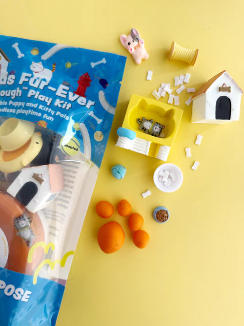 Pet themed playdough sensory kit with dog and cat figurines, charms, bowls and orange KidDough dough pieces styled in a bright flat lay for imaginative small world play