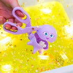 Toddler sensory exploration tools including scoop, tongs and expandable strainer
