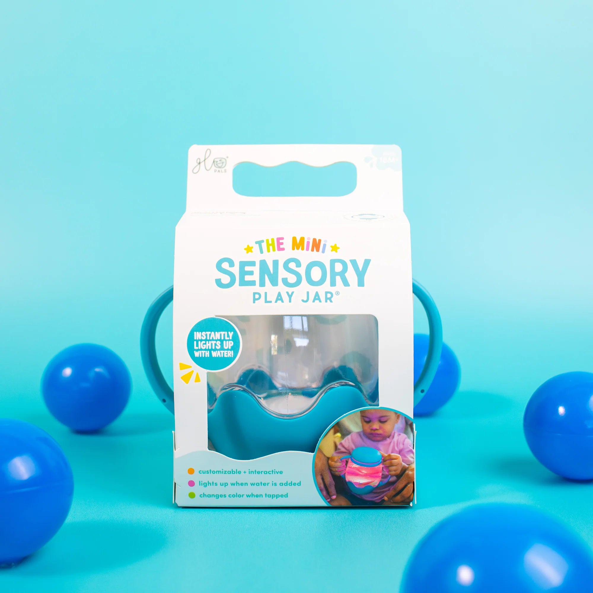 Portable blue sensory play jar for calming sensory play
