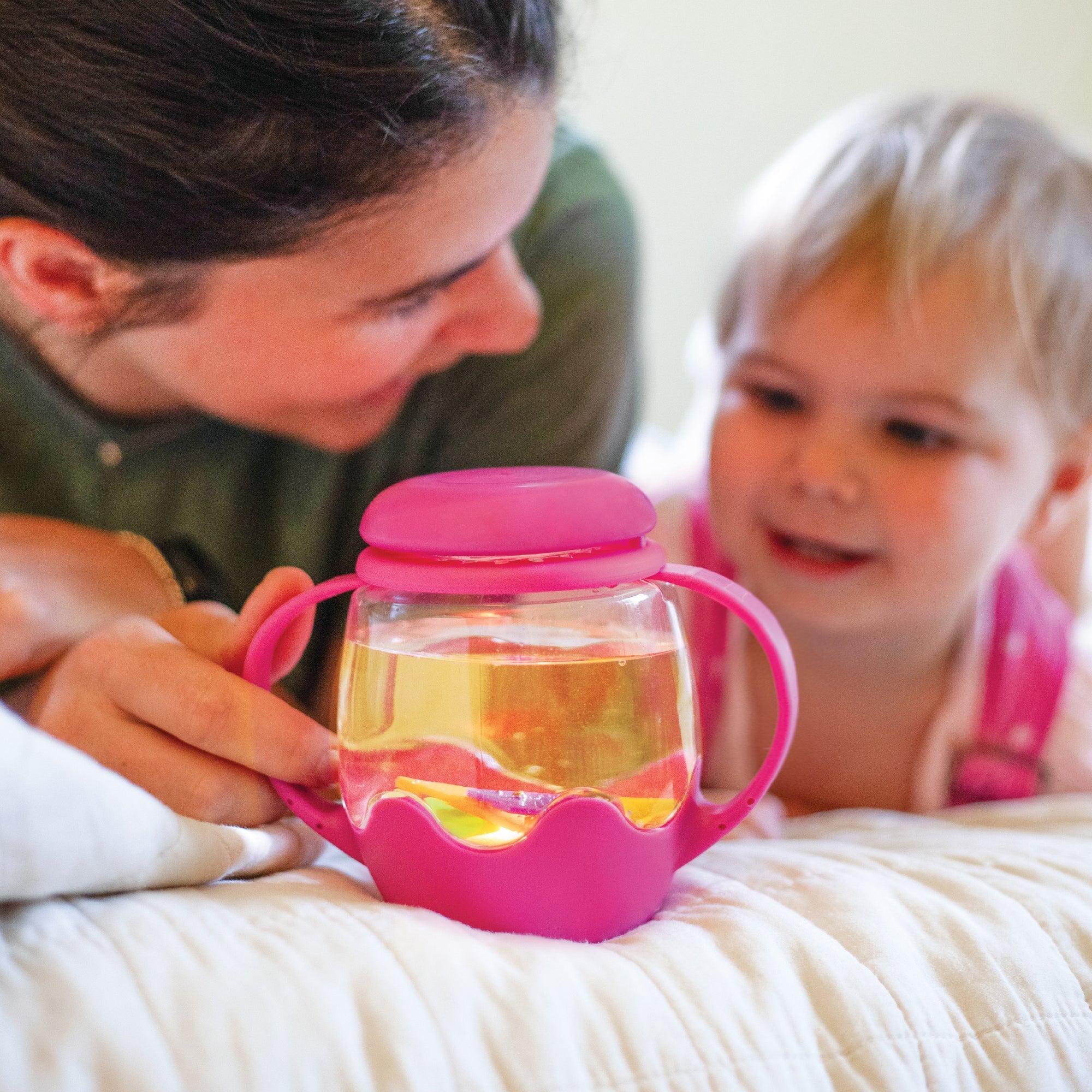 Portable pink sensory play jar for calming sensory exploration

