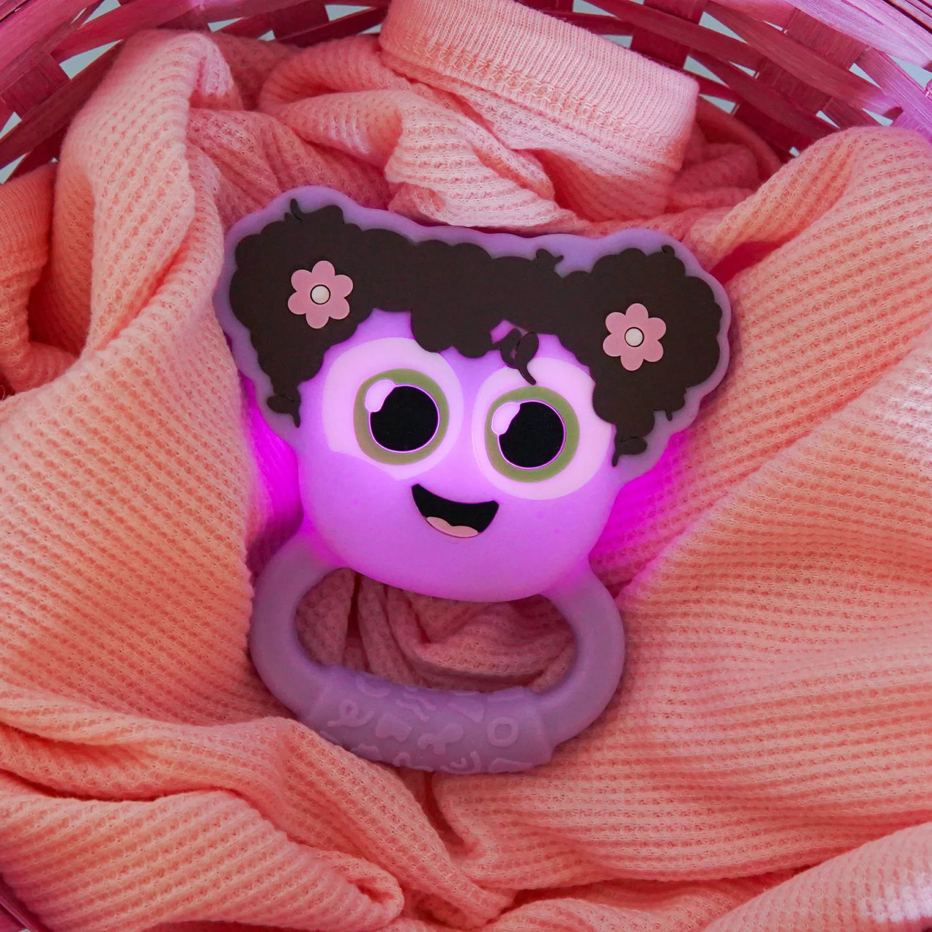 Jellystone Designs Glo Pals Light-Up Rattle purple sensory baby toy with easy grip handle
