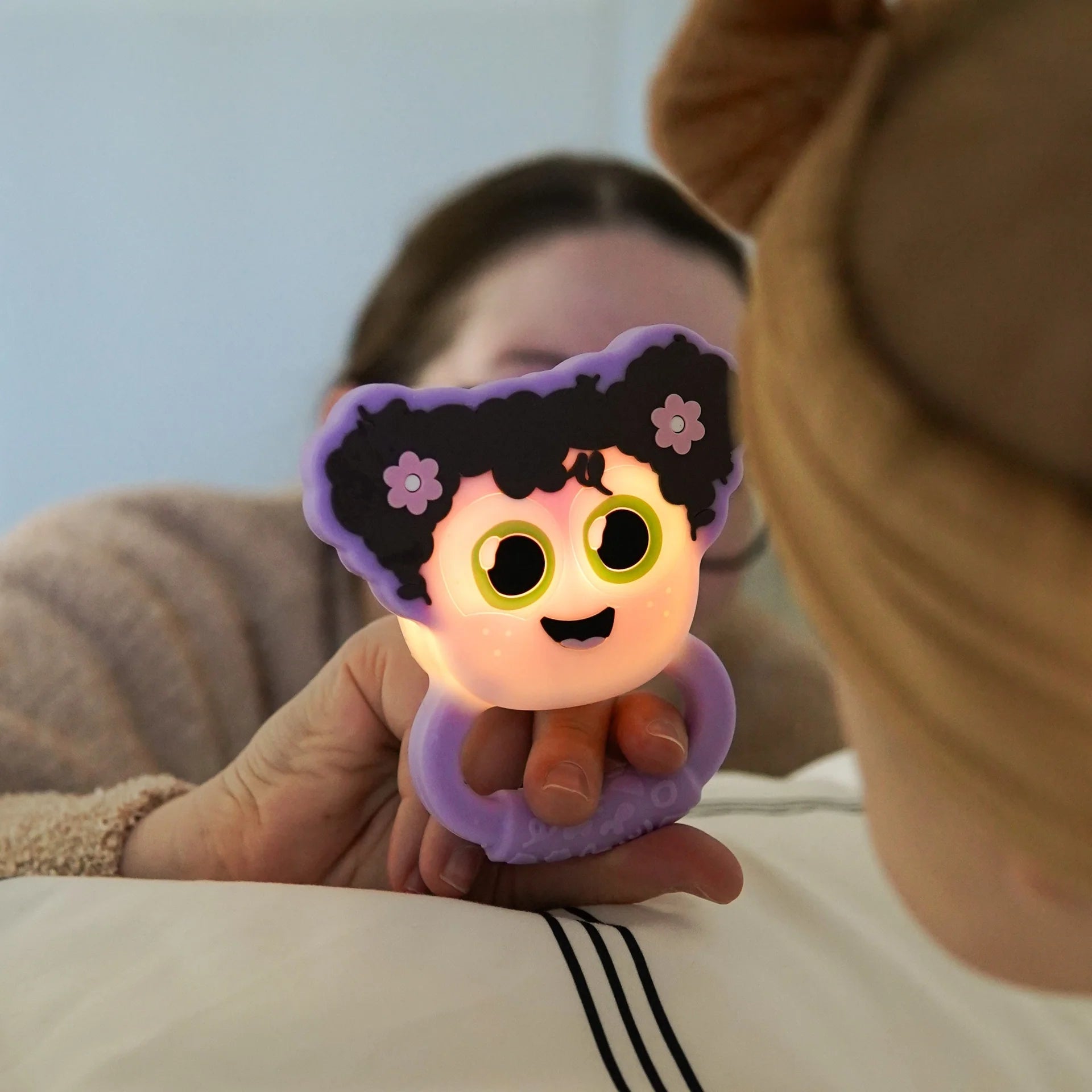 Glo Pals Light-Up Rattle baby sensory toy by Jellystone Designs in purple
