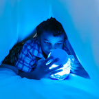 Interactive blue sensory play jar for toddlers
