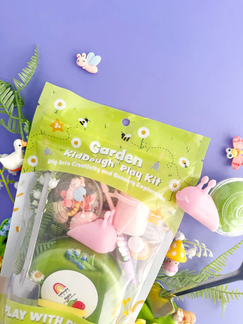 Garden themed kids playdough sensory kit with hidden figurines and floral charms, ideal for fine motor skills and imaginative nature play