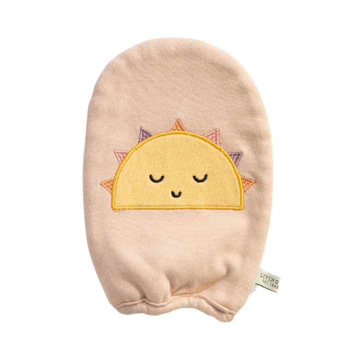 Baby bath mitt with smiling sun design in soft peach cotton fabric