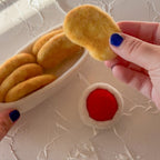 juni moon nuggets close up with tomato sauce felt food 