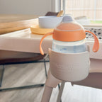 showing how to use toddle way highchair cup holder accessory fitted to kmart highchair