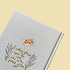 back of Grimm’s Fairy Tales collector’s edition hardback book with illustrated cover and gold foil lettering featuring classic fairytale stories