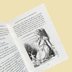inside of Alice in Wonderland collector’s edition hardback book with blush pink illustrated cover, gold foil lettering and sprayed heart cards page edges by Lewis Carroll. wordsworth collectors limited edition