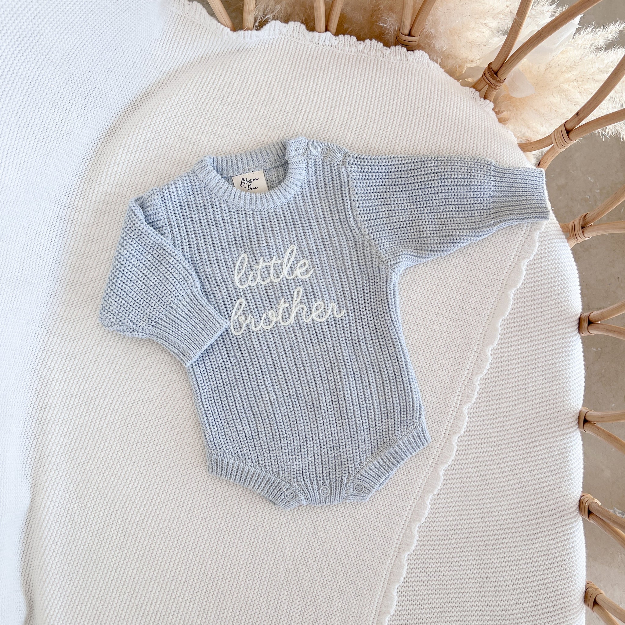Powder blue embroidered Little Brother cotton knit romper for babies