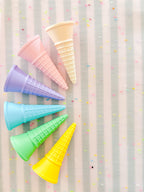 showing off colourful rainbow 3d printed eco ice cream cone for sensory play with clay, playdough, dough and more. brand is playsense. these are fun for kids. pictures is colours pink, beige, green, blue, purple and yellow