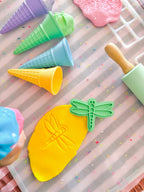 showing how to use image of playdough/clay stamp and cutter. Eco-friendly sensory play tool by brand playsense perfect for creative and imaginative play. can also be used for cookies and baking. pictured is dragonfly