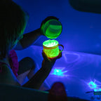 Children’s green water activated light up cubes for sensory play
