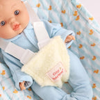 close up of blue ducky Dolls Car Seat Capsule by tiny harlow with a doll inside
