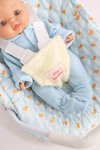 another close up of blue ducky Dolls Car Seat Capsule by tiny harlow with a little boy doll inside