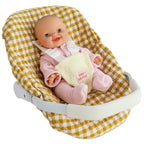 mustard gingham Dolls Car Seat Capsule by tiny harlow with a doll inside