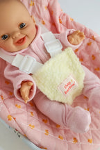 close up of pink ducky Dolls Car Seat Capsule by tiny harlow with a doll inside
