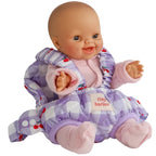 baby dolls carrier made by tiny harlow with a baby inside for pretend play, the print is lilac cherry