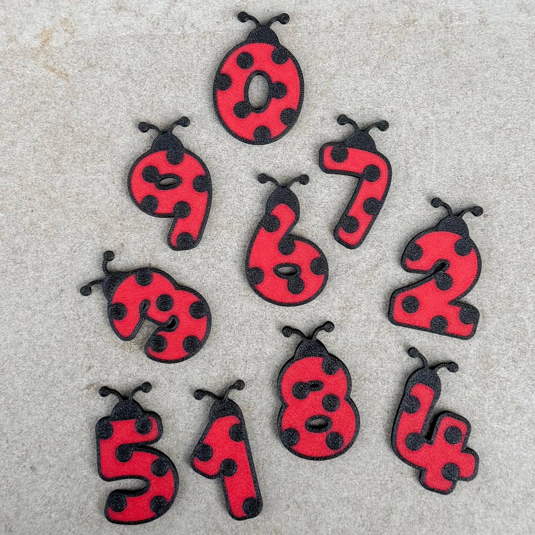 Little Ladybug Number Set by Honey Hollow featuring numbers 0-9 in ladybug designs