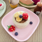 set up with a lot of other felt food felt pancake stack toy set handmade wool pretend play food with berries and banana Tara Treasures