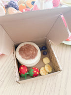 inside the box felt pancake stack toy set handmade wool pretend play food with berries and banana Tara Treasures