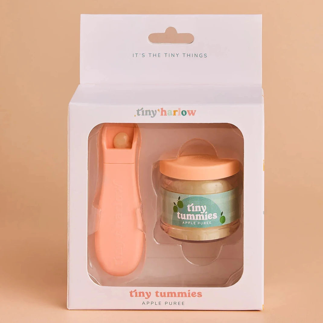 packaging of jar of tiny tummies pretend baby dolls food which is magic and disappearing, perfect gifting brand is tiny harlow and flavour is apple puree