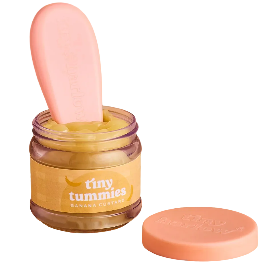 jar of tiny tummies pretend baby dolls food which is magic and disappearing, brand is tiny harlow and flavour is banana custard
