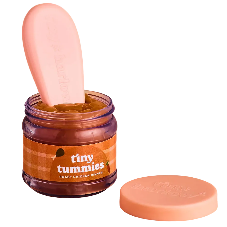 jar of tiny tummies pretend baby dolls food which is magic and disappearing, brand is tiny harlow and flavour is roast chicken dinner