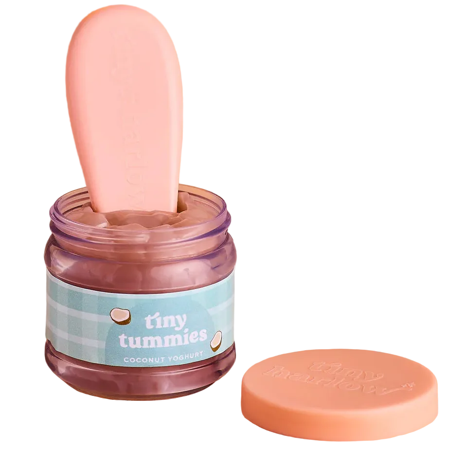 jar of tiny tummies pretend baby dolls food which is magic and disappearing, brand is tiny harlow and flavour is coconut yoghurt