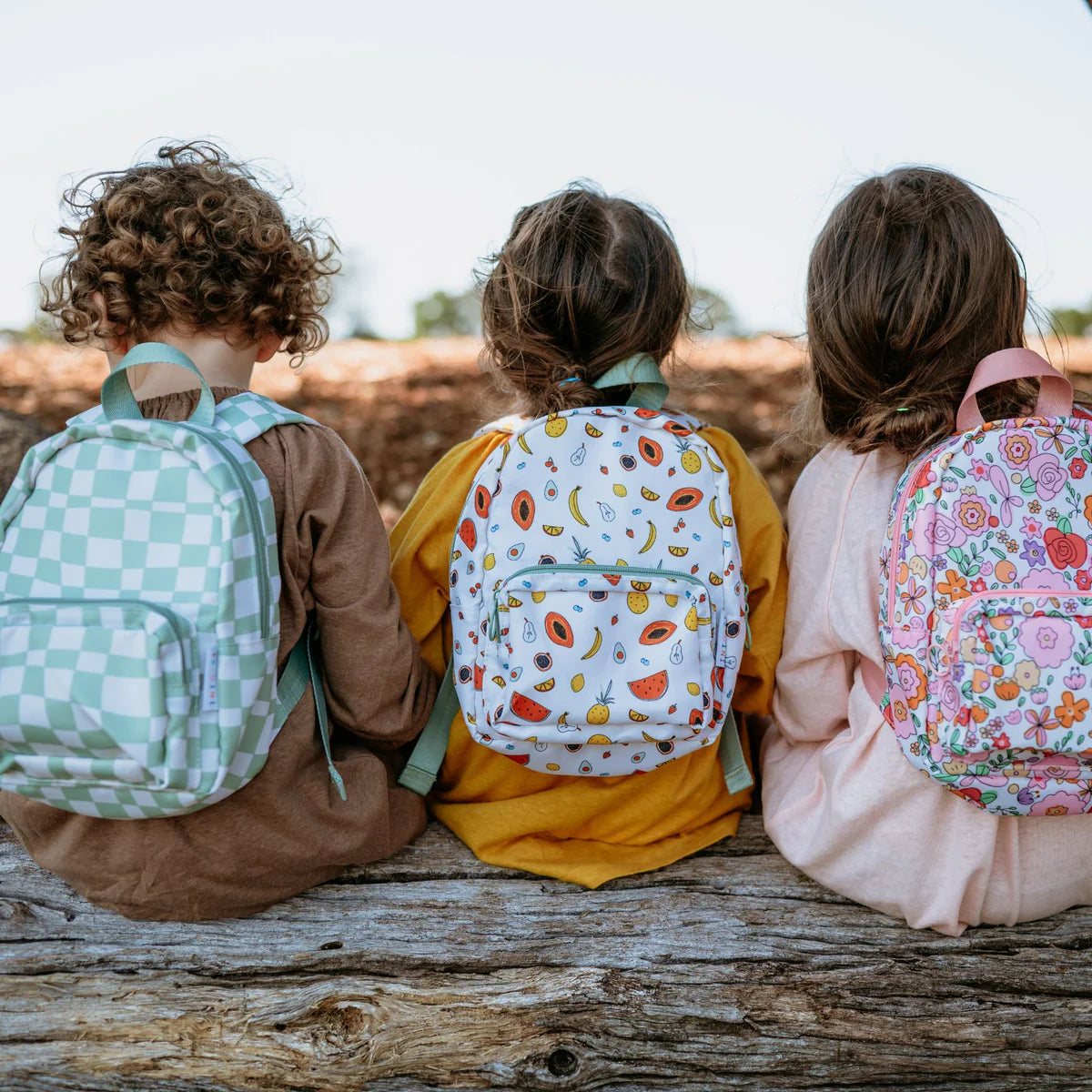 3 kids photoshoot wearing toddler backpacks, perfect for on the go and have matching accessories. can also be personalised with childs name. this print is parker, paloma and clementine