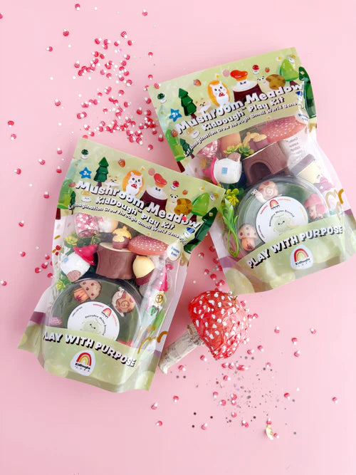 Mushroom meadow KidDough play kits grouped together with charms and sprinkles on pastel background, sensory dough sets for creative pretend play
