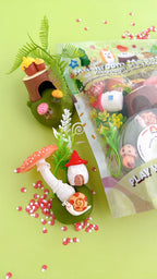 Woodland playdough sensory kit with mushroom charms, tree stump, forest animals and textured green dough styled for small world nature play