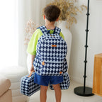 teenage wearing Fox & Fallow backpack for kids, perfect for school, daycare and everyday use. Spacious, practical and designed for little adventures. Personalisation of embroidery with name also available on bags in 2 placements. This print is blue diamonds with matching lunch bags