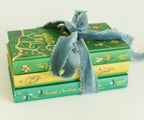 present look of The Wind in the Willows collector’s edition hardback book with green illustrated cover and gold foil lettering by Kenneth Grahame