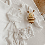Handcrafted bee baby rattle with soft crochet details and gentle internal rattle