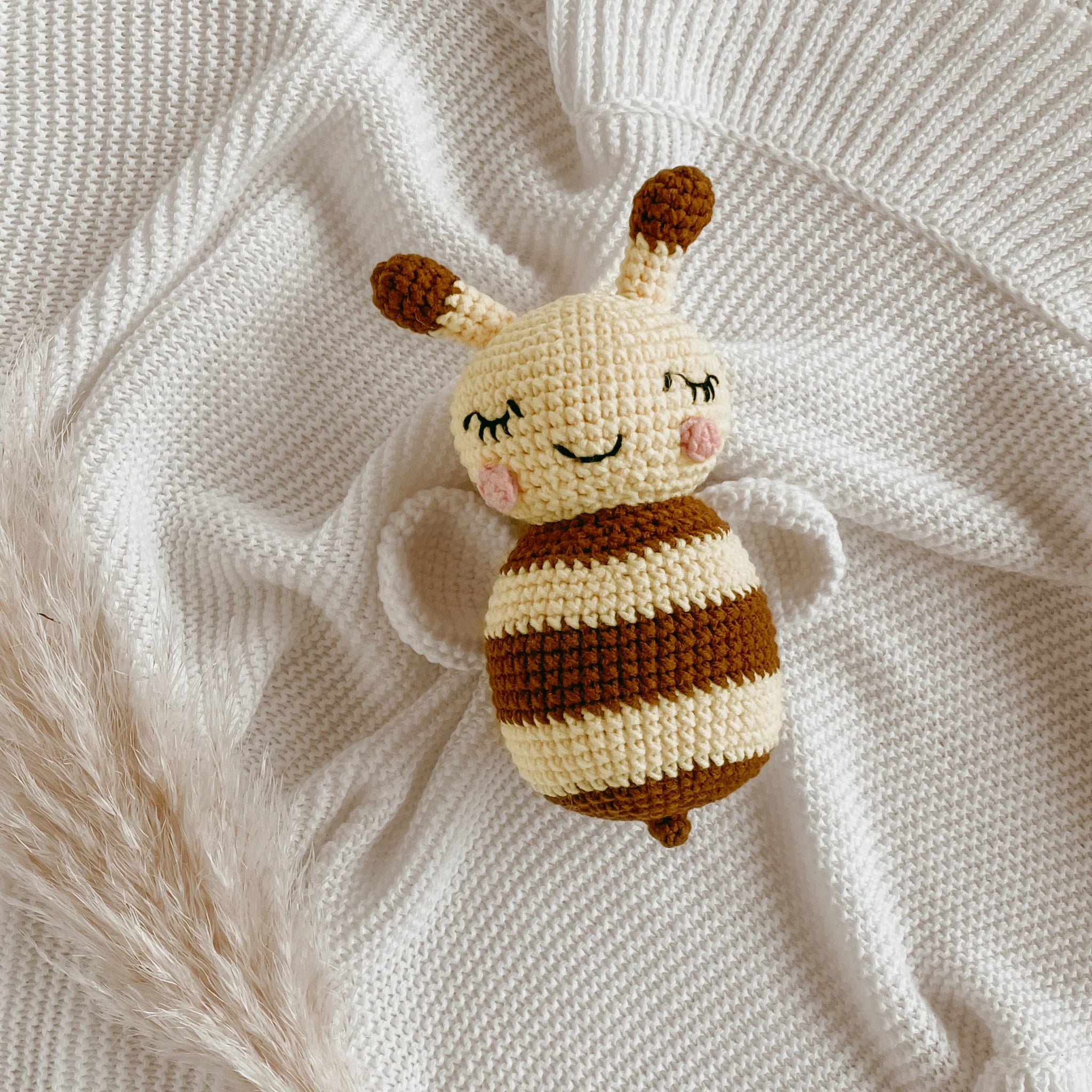 Honey Bee crochet baby rattle by Blossom and Pear handcrafted in soft milk cotton